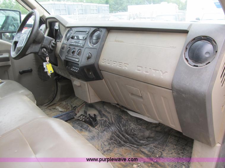 image for item G6526 2008 Ford F550 Super Duty XL Crew Cab flatbed truck