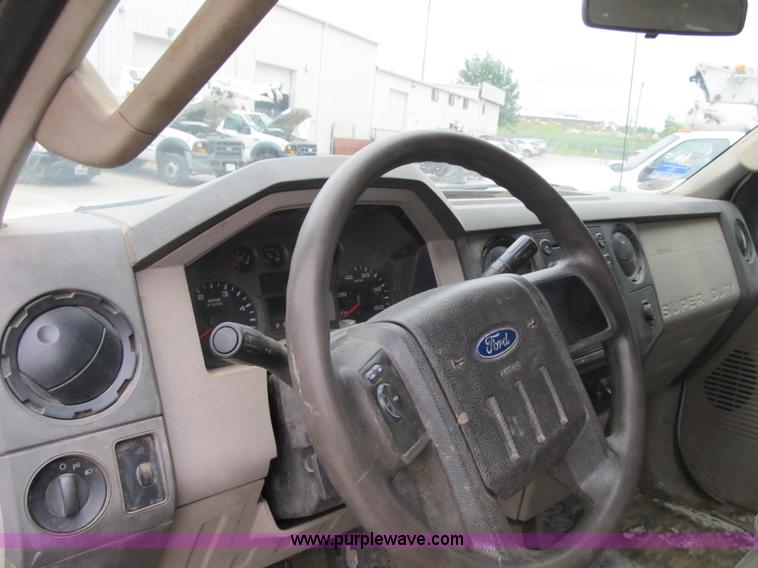 image for item G6526 2008 Ford F550 Super Duty XL Crew Cab flatbed truck