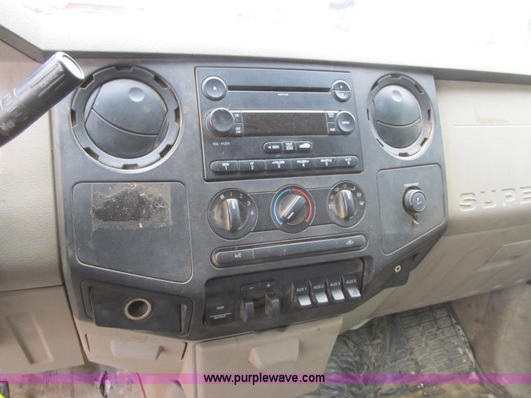 image for item G6526 2008 Ford F550 Super Duty XL Crew Cab flatbed truck