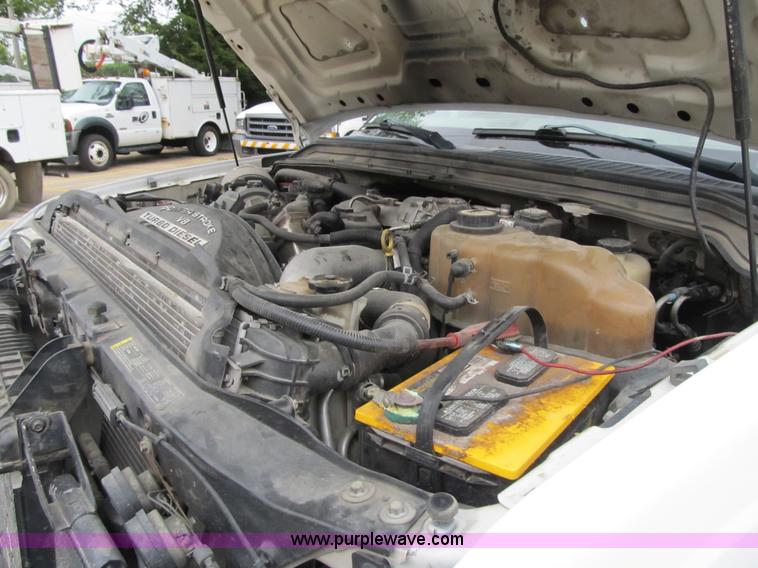 image for item G6526 2008 Ford F550 Super Duty XL Crew Cab flatbed truck