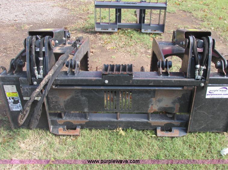 image for item J2404 Caterpillar 2869300 skid steer grapple bucket