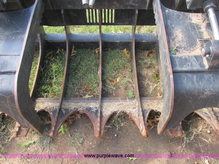 image for item J2404 Caterpillar 2869300 skid steer grapple bucket