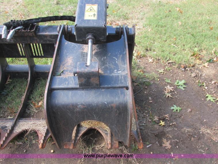 image for item J2404 Caterpillar 2869300 skid steer grapple bucket