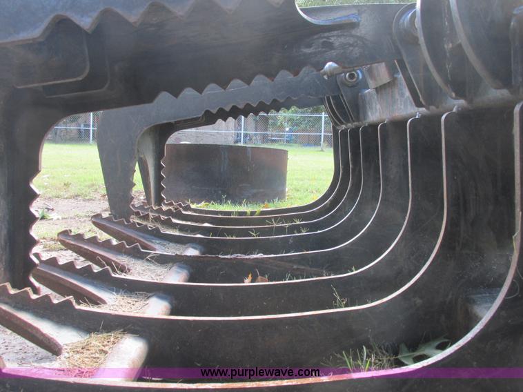 image for item J2404 Caterpillar 2869300 skid steer grapple bucket