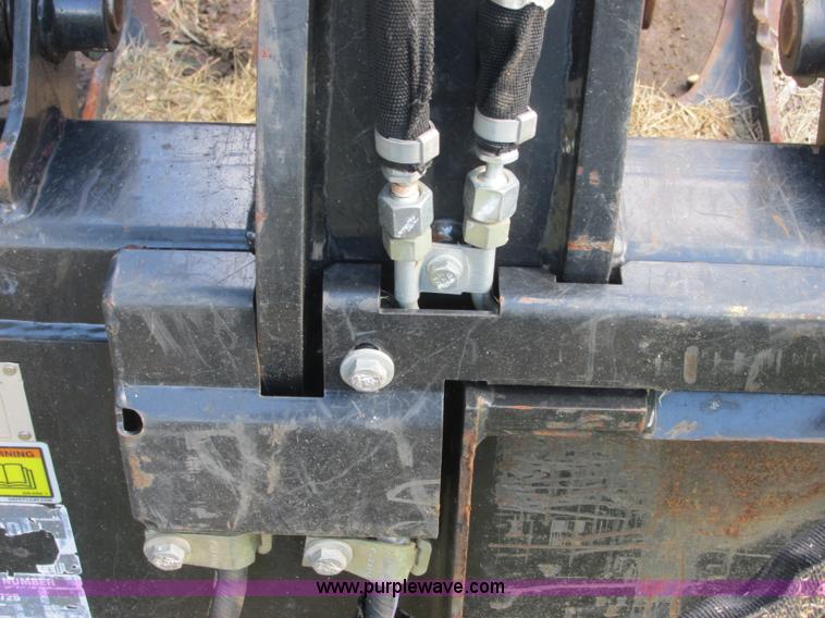 image for item J2404 Caterpillar 2869300 skid steer grapple bucket