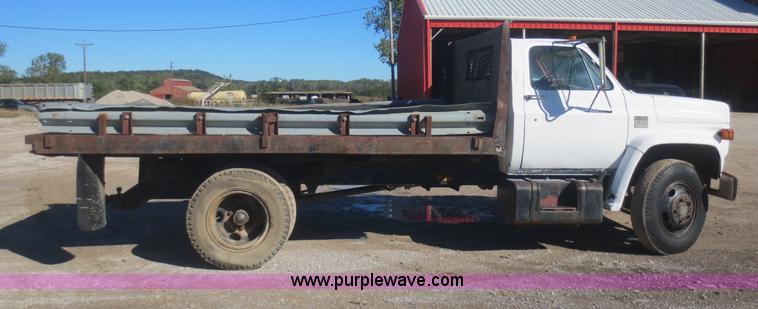 image for item D2180 1978 Chevrolet C60 flat bed dump truck