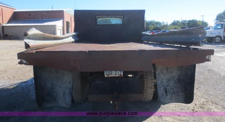 image for item D2180 1978 Chevrolet C60 flat bed dump truck