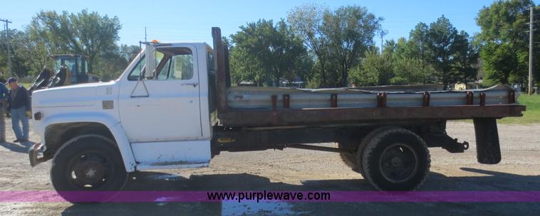 image for item D2180 1978 Chevrolet C60 flat bed dump truck