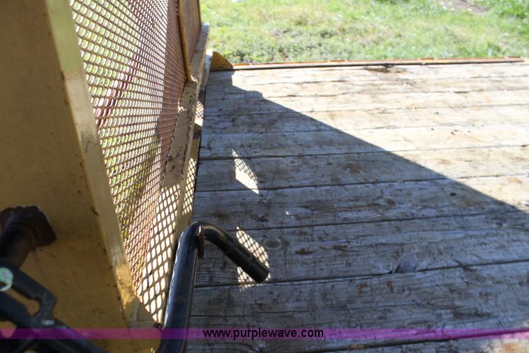 image for item H8800 2006 Titan tilt deck trailer