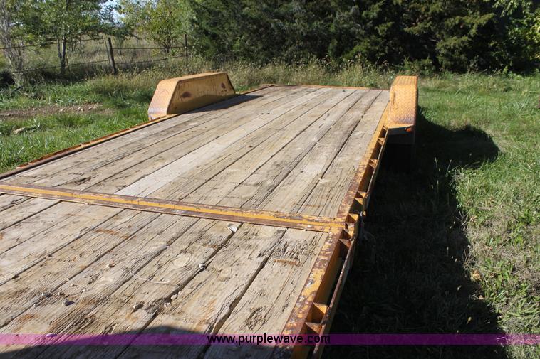 image for item H8800 2006 Titan tilt deck trailer