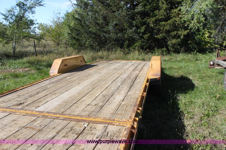 image for item H8800 2006 Titan tilt deck trailer