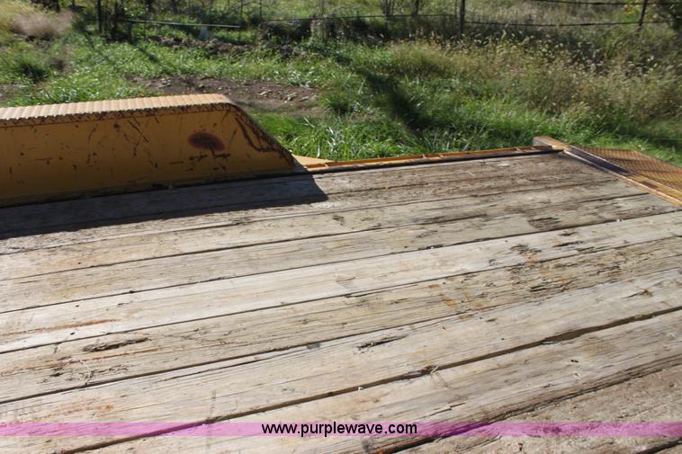 image for item H8800 2006 Titan tilt deck trailer