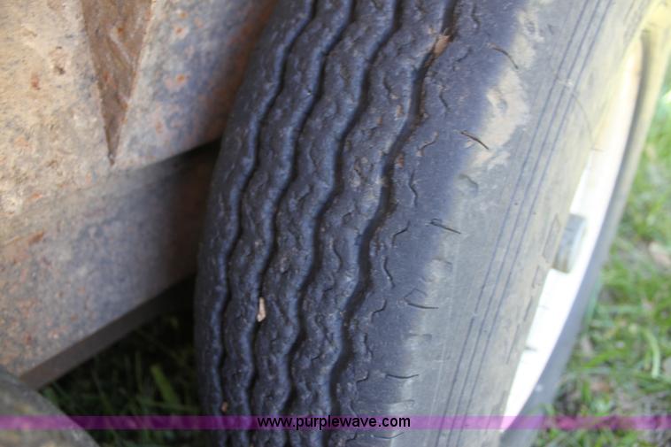 image for item H8800 2006 Titan tilt deck trailer