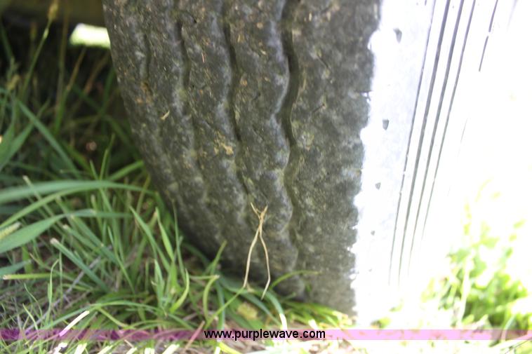 image for item H8800 2006 Titan tilt deck trailer