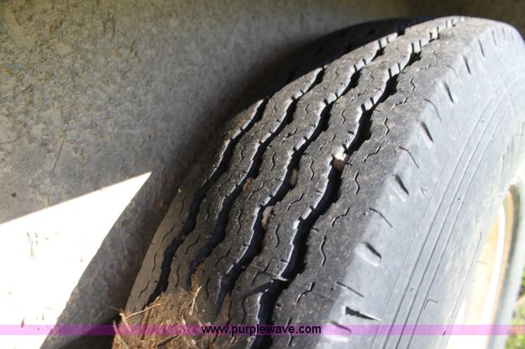 image for item H8800 2006 Titan tilt deck trailer