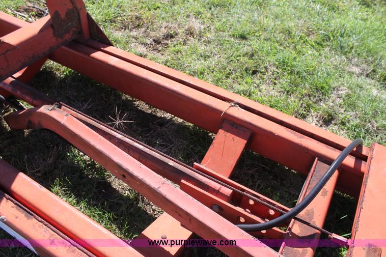 image for item H8808 New Holland 90 bale handler