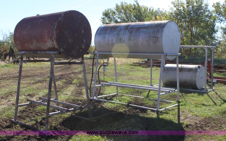 image for item H8809 (3) overhead fuel barrels