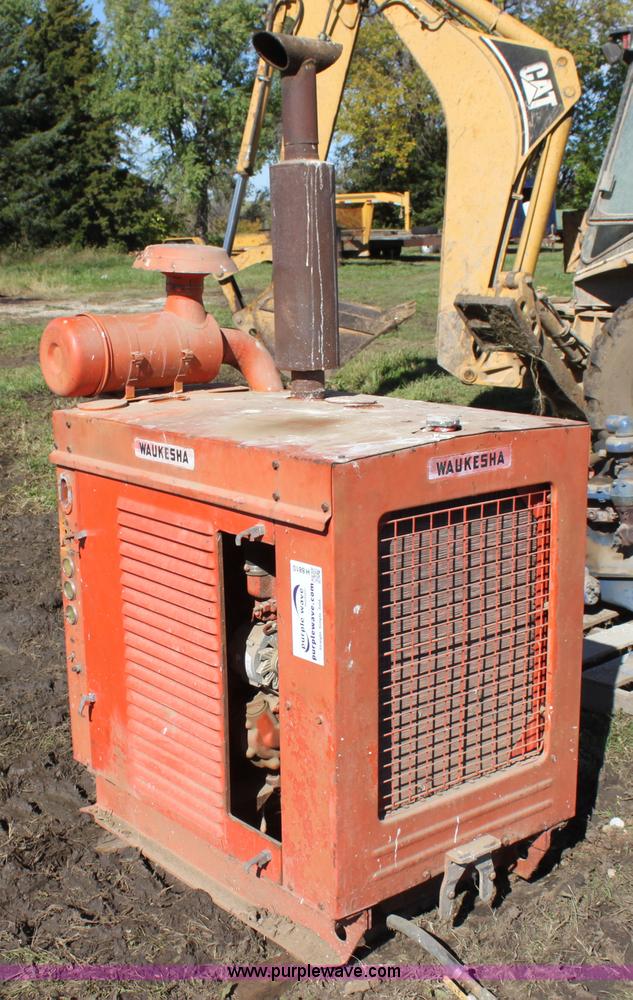 image for item H8810 Waukesha four cylinder stationary engine