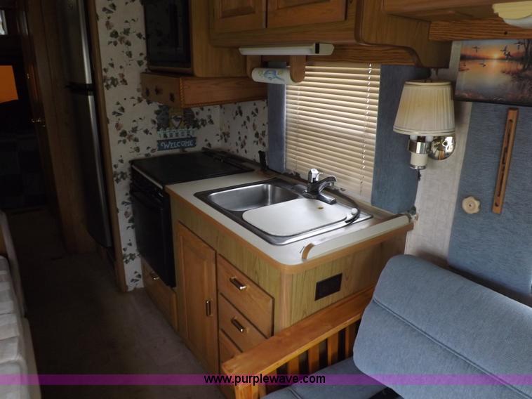 image for item H9059 1990 Itasca Sunflower Winnebago RV