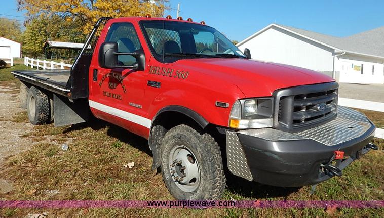 image for item I5324 2003 Ford F350 Super Duty XL flatbed pickup truck