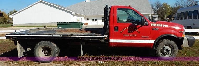 image for item I5324 2003 Ford F350 Super Duty XL flatbed pickup truck