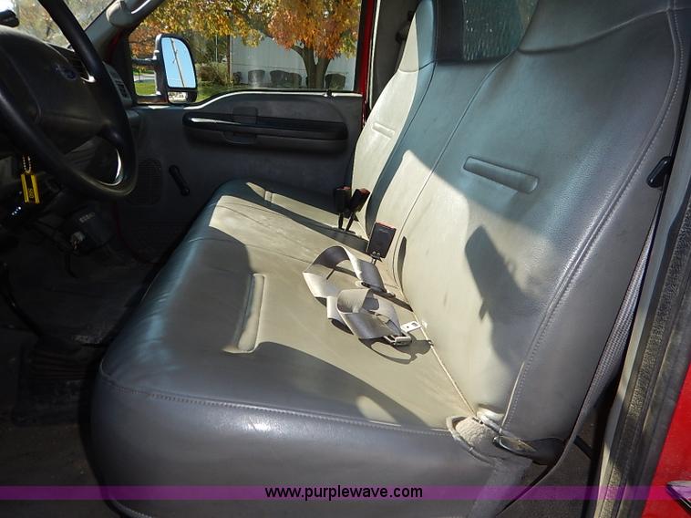 image for item I5324 2003 Ford F350 Super Duty XL flatbed pickup truck