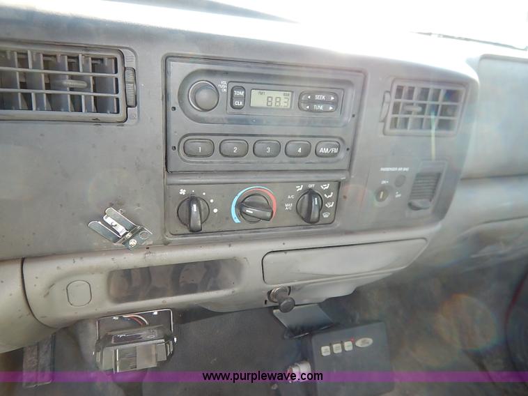 image for item I5324 2003 Ford F350 Super Duty XL flatbed pickup truck