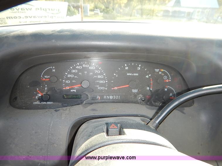 image for item I5324 2003 Ford F350 Super Duty XL flatbed pickup truck