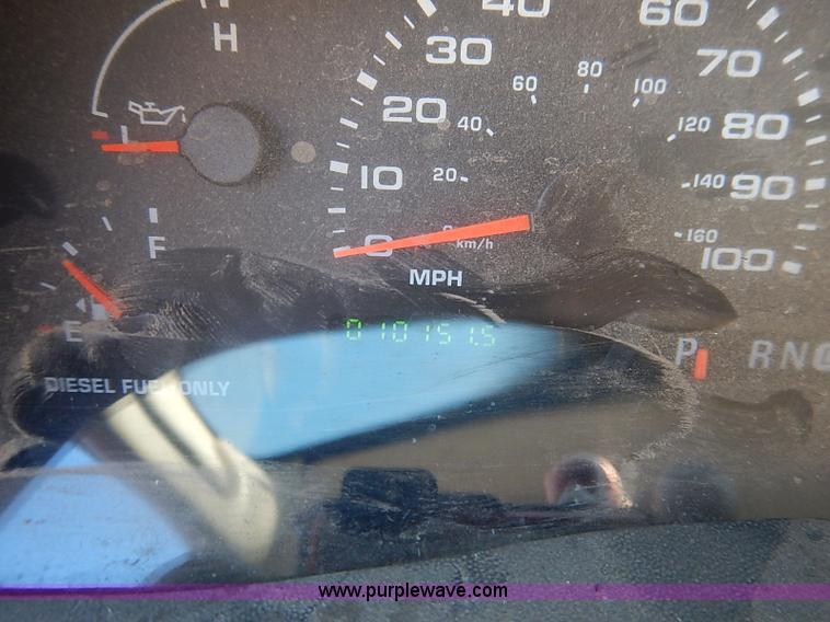 image for item I5324 2003 Ford F350 Super Duty XL flatbed pickup truck