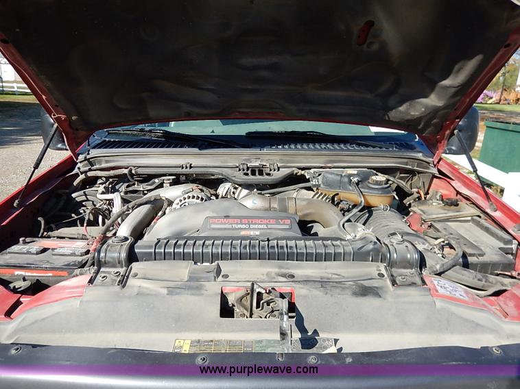 image for item I5324 2003 Ford F350 Super Duty XL flatbed pickup truck