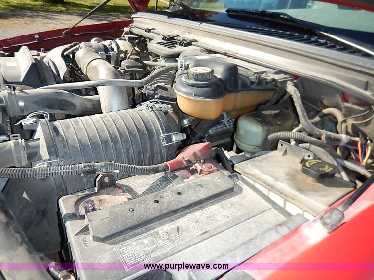 image for item I5324 2003 Ford F350 Super Duty XL flatbed pickup truck