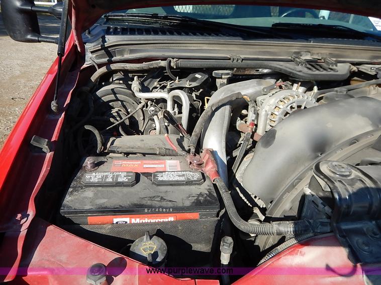 image for item I5324 2003 Ford F350 Super Duty XL flatbed pickup truck