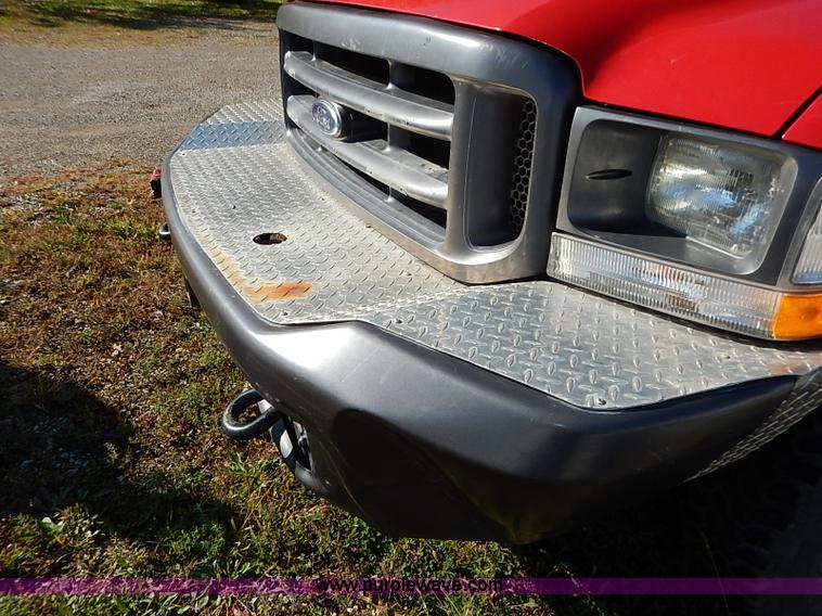 image for item I5324 2003 Ford F350 Super Duty XL flatbed pickup truck