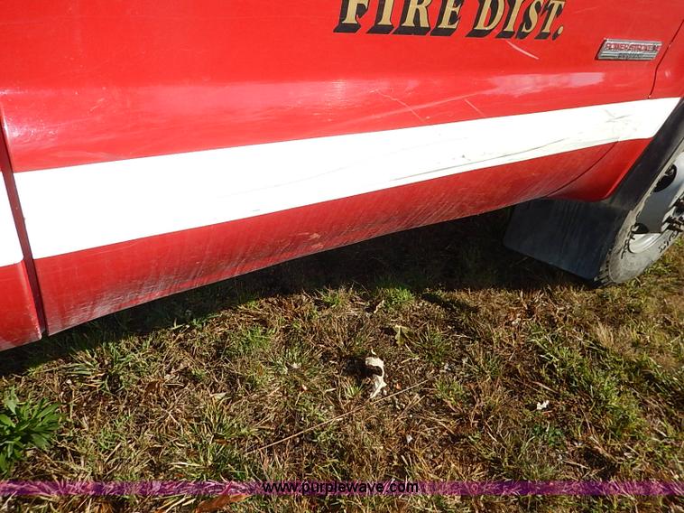 image for item I5324 2003 Ford F350 Super Duty XL flatbed pickup truck