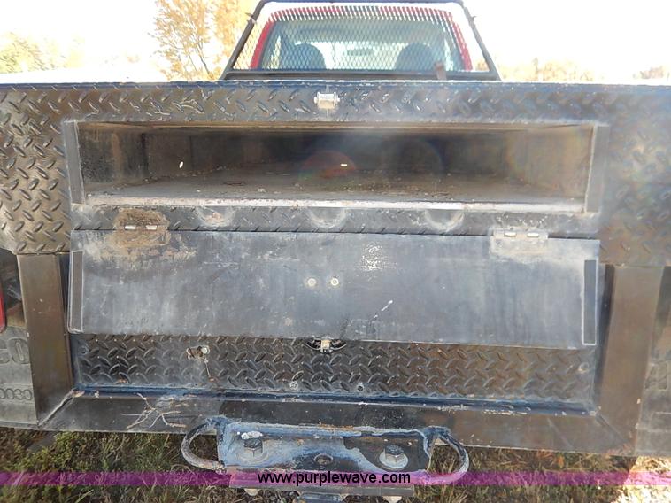 image for item I5324 2003 Ford F350 Super Duty XL flatbed pickup truck