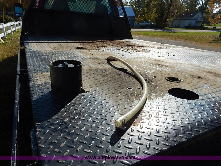 image for item I5324 2003 Ford F350 Super Duty XL flatbed pickup truck