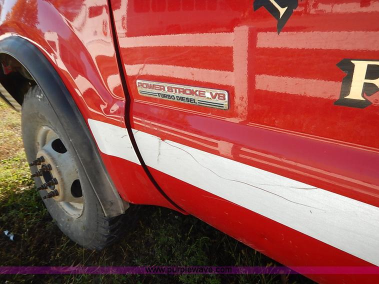 image for item I5324 2003 Ford F350 Super Duty XL flatbed pickup truck