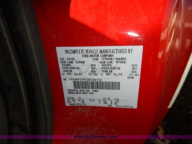 image for item I5324 2003 Ford F350 Super Duty XL flatbed pickup truck