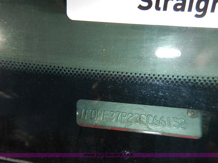 image for item I5324 2003 Ford F350 Super Duty XL flatbed pickup truck