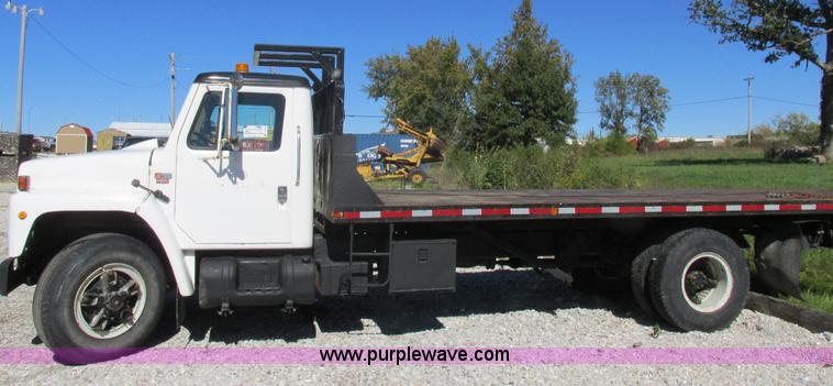 image for item I8908 1983 International 1954 rollback truck