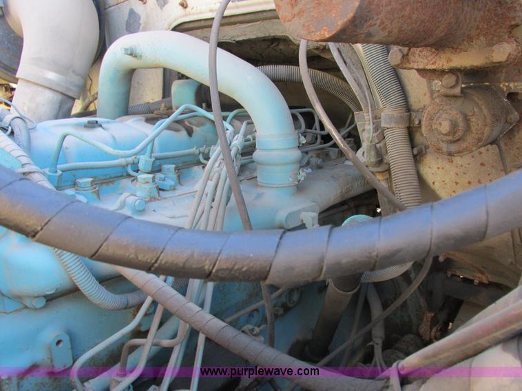 image for item I8908 1983 International 1954 rollback truck