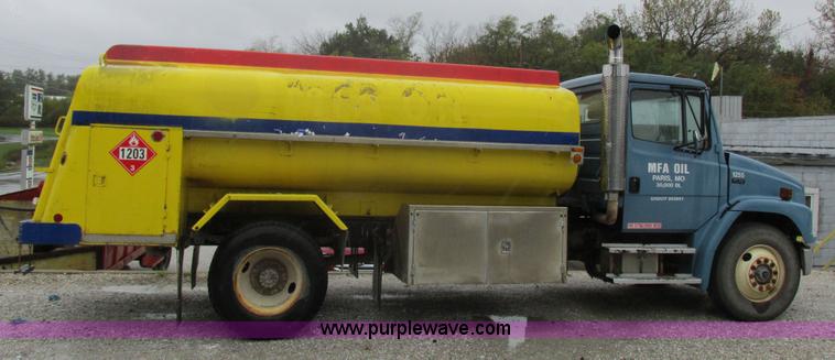 image for item I8910 1999 Freightliner FL70 fuel truck