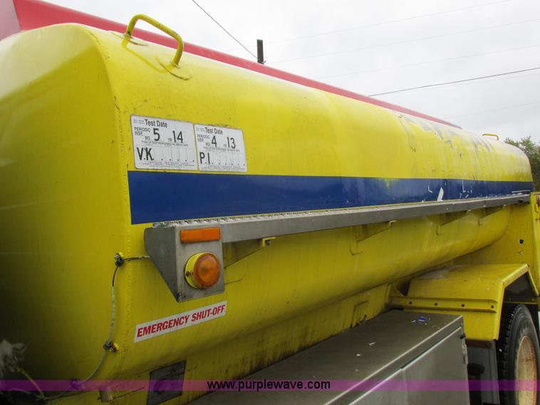 image for item I8910 1999 Freightliner FL70 fuel truck