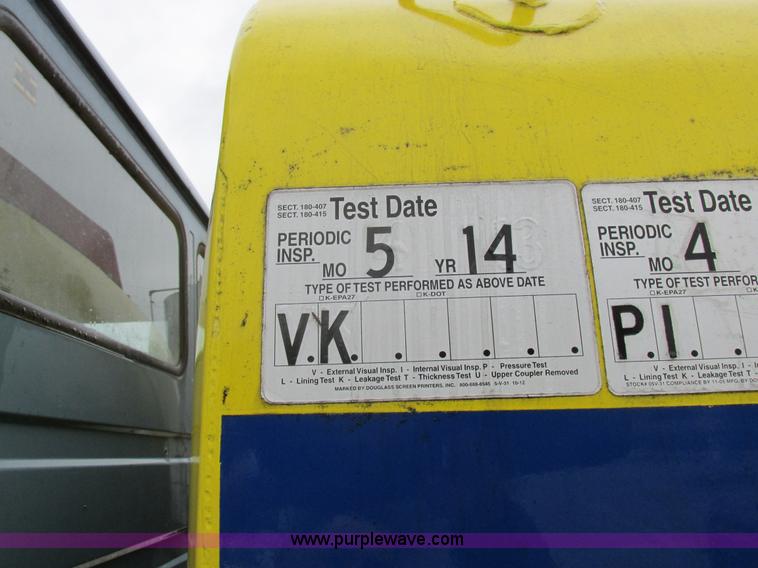 image for item I8910 1999 Freightliner FL70 fuel truck