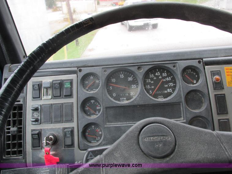 image for item I8910 1999 Freightliner FL70 fuel truck