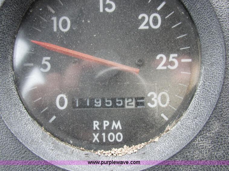 image for item I8910 1999 Freightliner FL70 fuel truck