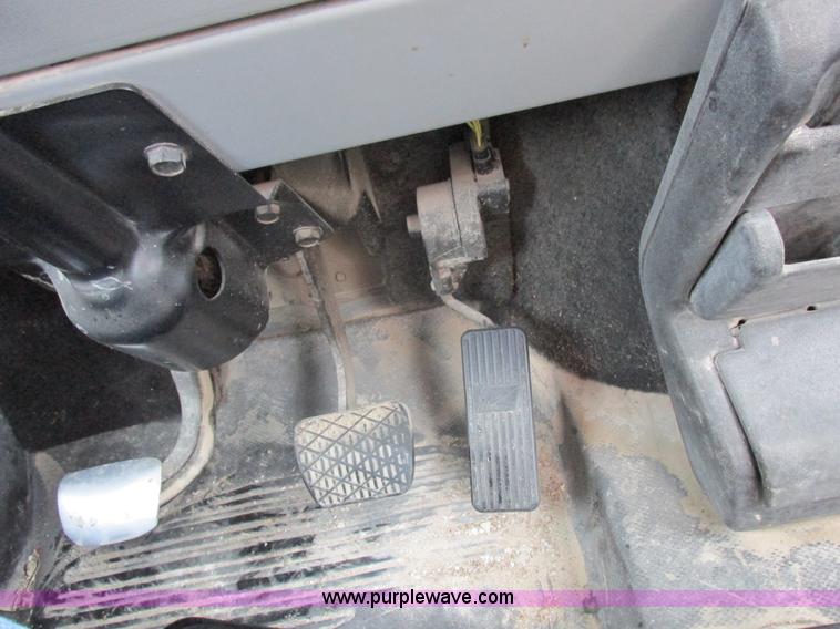 image for item I8910 1999 Freightliner FL70 fuel truck