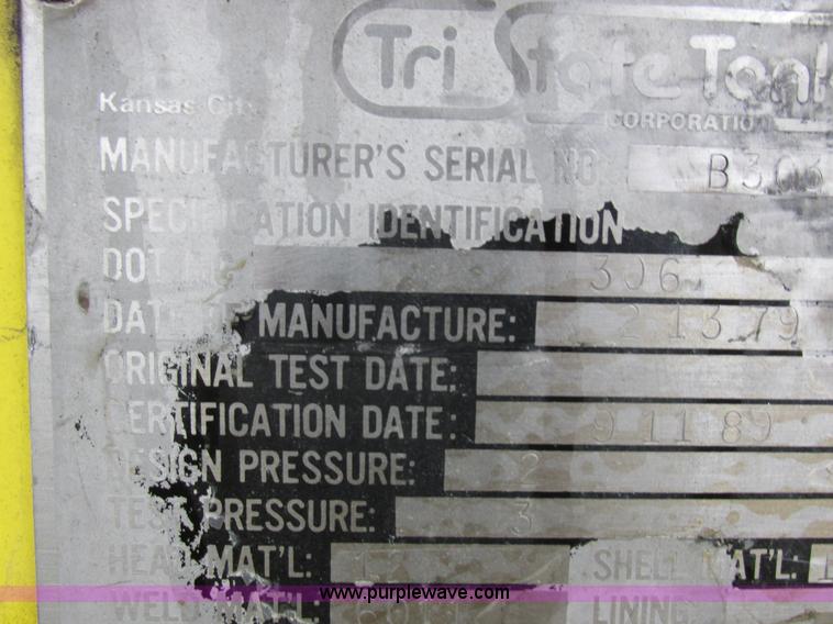 image for item I8910 1999 Freightliner FL70 fuel truck