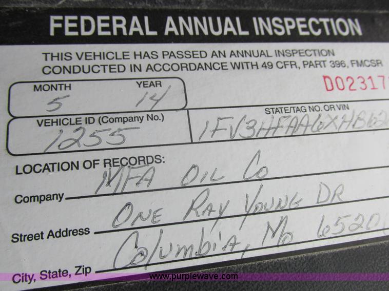 image for item I8910 1999 Freightliner FL70 fuel truck