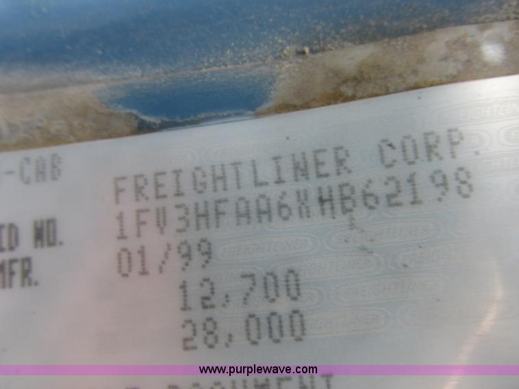 image for item I8910 1999 Freightliner FL70 fuel truck